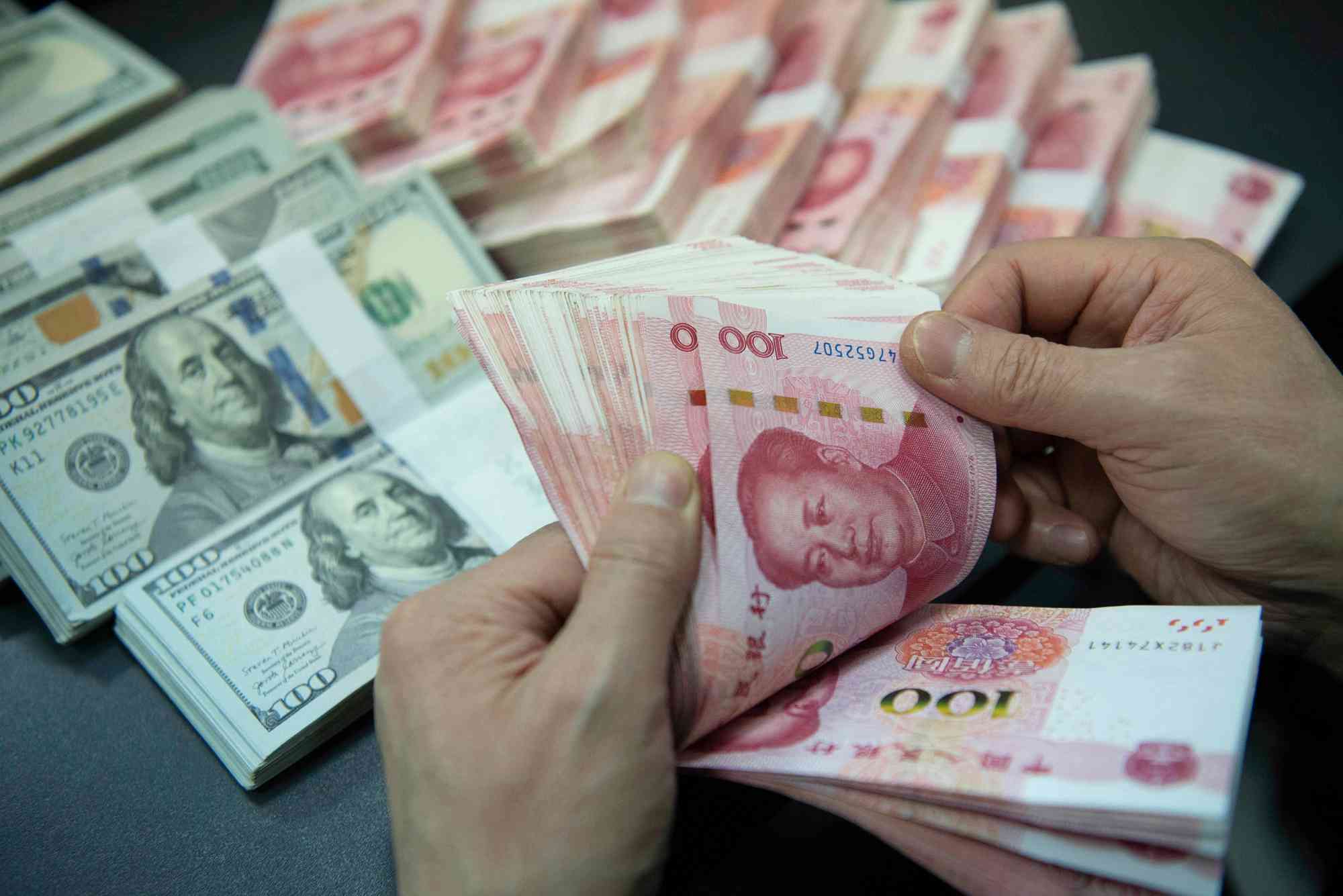 人民幣｜人行降外匯風險準備金率至零緩升值預期，人民幣匯率應聲跌