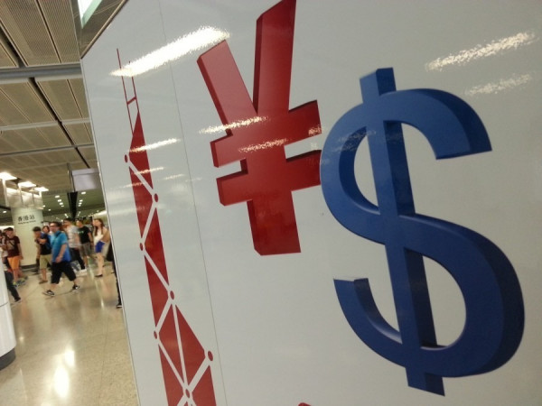 【FOCUS】貨幣、投資戰暗啟？人幣如石下墜VS投資審查收緊